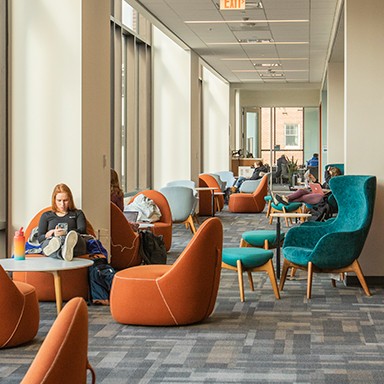 A seating area on the third floor of the Danielle Ripich Commons on the Biddeford Campus